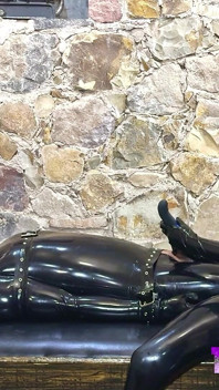 Rubber Slave Is Used Sexually
