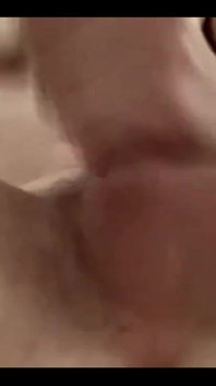 Masturbating