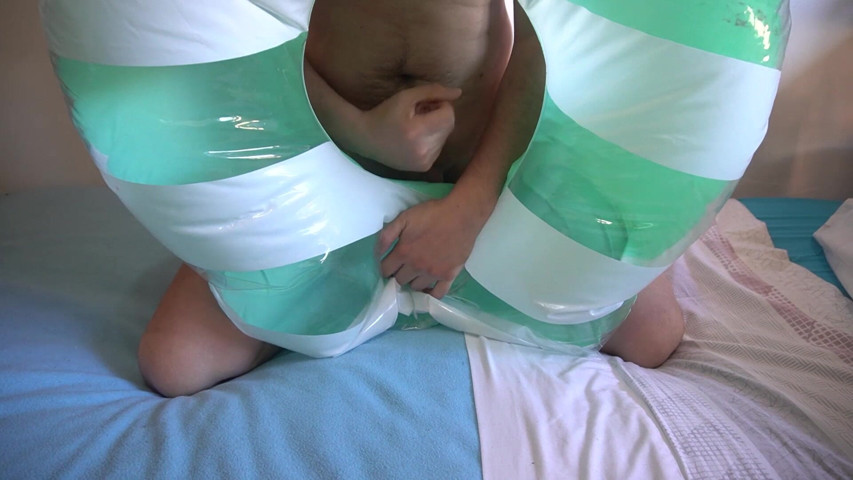 Playing with a Green and White Swimring (Inflatable Lovers) Playing with a Green and White Swimring (Inflatable Lovers)