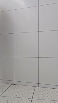 Sissy Kanisa Is Taking Shower in White Shower Room
