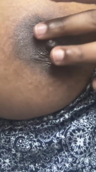 Playing with Her Nipple