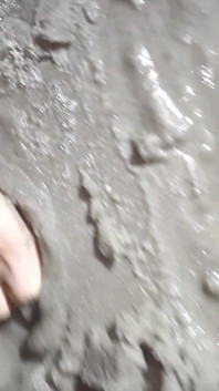 Beach Feet Covered in Wet Sand