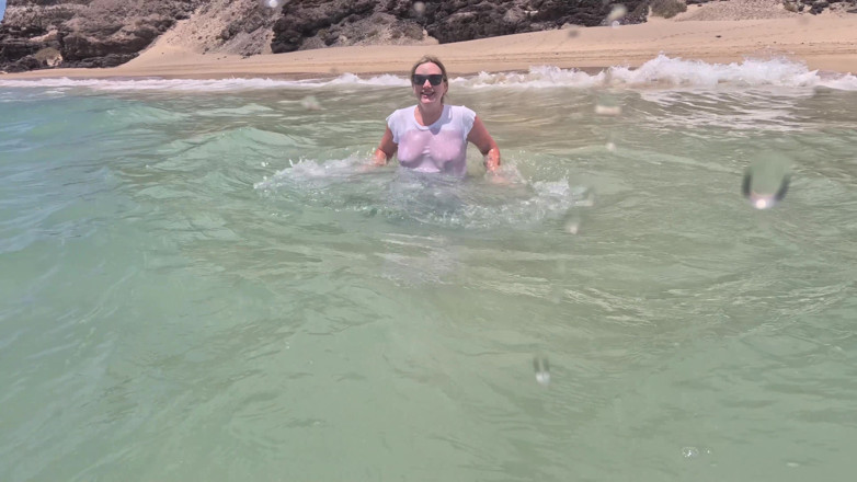 Emma Voyeur: Girl Wetting Jeans in the Ocean and Swimming in Wet...