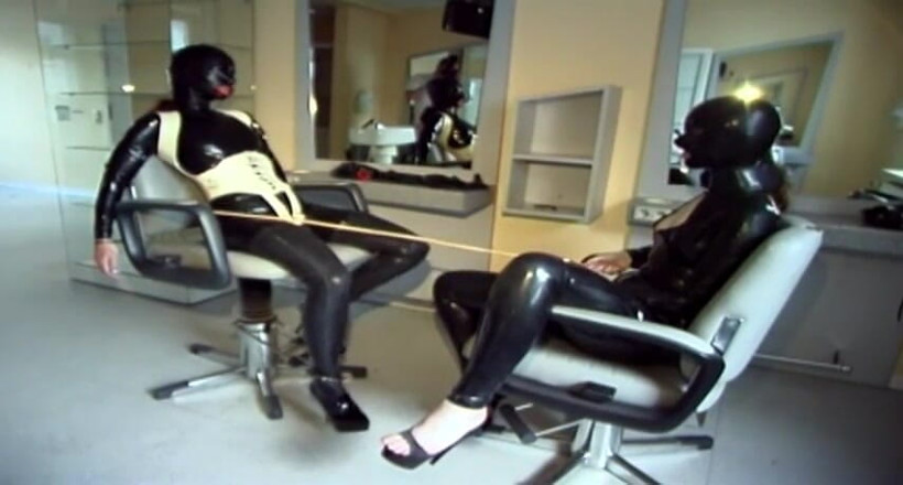 Fetish Desire: Masked redhead in latex gets tied up
