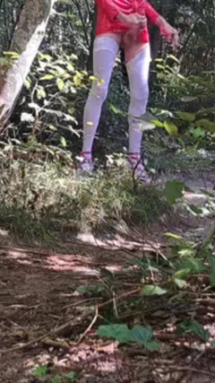 Outdoor Exhibition In The Woods Pink Heels White Stockings And Latex Mini Skirt thumbnail
