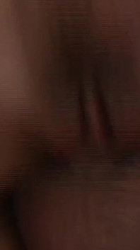 She Lies Naked on the Beach While He Watches Her