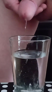 Cumming in a glass of hot water 