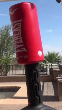 Smoking outdoor with the boxing muscled lady