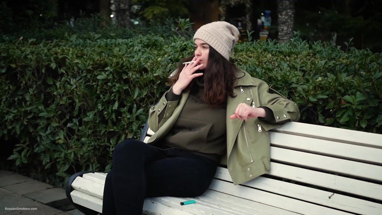 Russian Smokers: Young Brunette Is Taking an Unhurried Stroll with Allwhite 120mm Cigarette