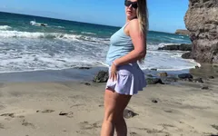 Girl Peeing and Wetting Skirt Pants at the Public Beach