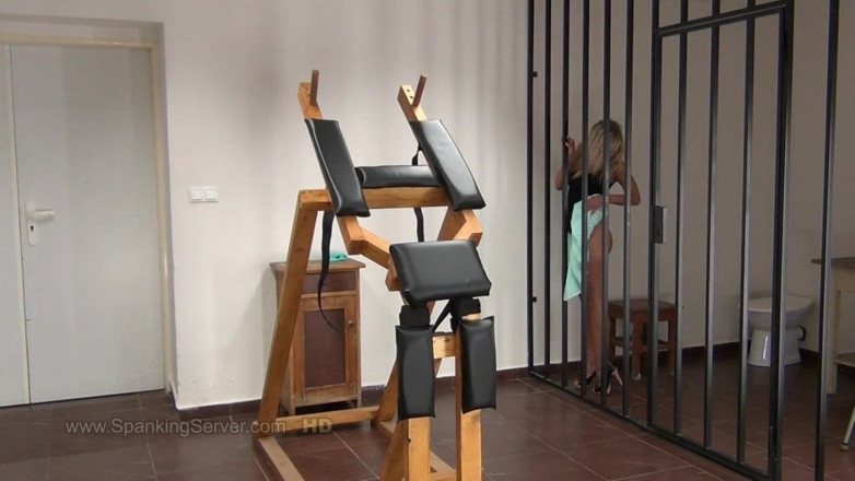 Spanking Server: Miela gets caned at the prison