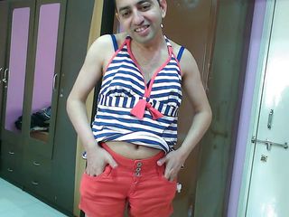 Cute & Nude Crossdresser: Sexy sissy crossdresser in red shorts and helther neck top...