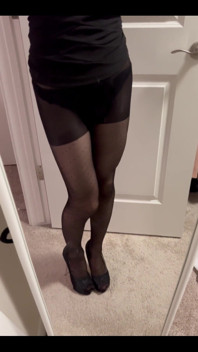 Looking Self in the Mirror in the Poka Dots Black Pantyhose.