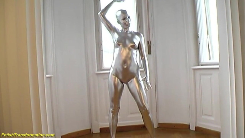 Fetish Islands: Silver metallic painted bald head statue mannequins posing