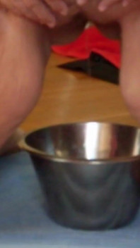 Jen Is Pissing Into a Steel Bowl