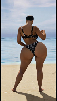 Mrs. Gunther Shaking It at the Beach