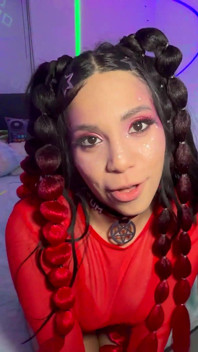 Red Bows, Glitter Freckles: Gigi Star Owns the Blacklit Room Tonight!
