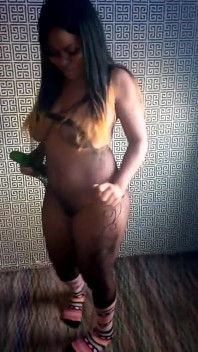 Lady Ends up with Cucumber While Waiting for Her Man to Come Home.