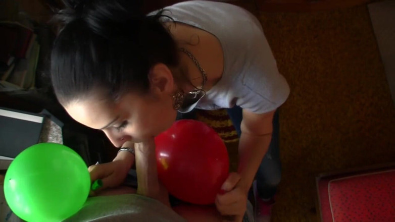 Facial flavor: Adorable brunette licking sperm from balloon