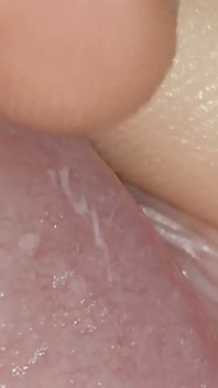 Wide Hole Filled with Pre Cum in Close up