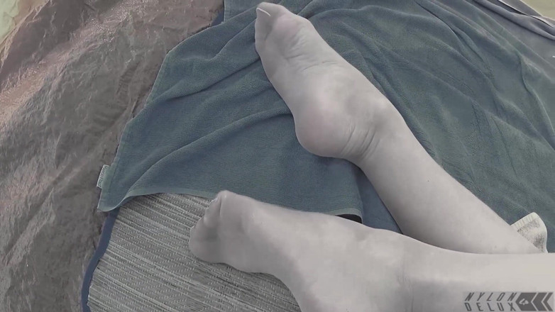 Nylondelux: Nude stocking on the beach
