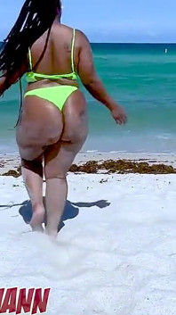 Big Booty Black Girl in a Bikini on the Beach