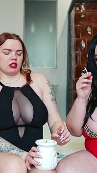 Two College Girls with Big Breasts Smoke Cigarettes and Fuck Each Other with a Double Dildo.