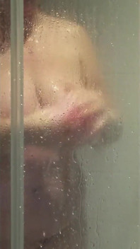 Watch Julie in the Shower Getting Ready for Client