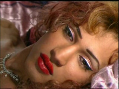 Redhead transsexual in sexy lingerie jerks off her cock