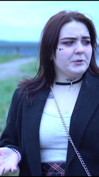 A Beauty with a Tattoo Shows Her Tits