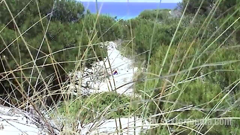 Sextermedia by Pete: Redhead Beauty Dildoing Pussy on the Sandy Beach