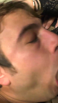Two slutty trannies share a young ass