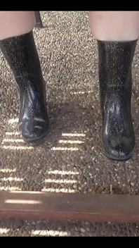 With Rubber Boots Outdoors