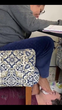 Kiffa Uses Slave as Footstool as She Uses Her Notebook