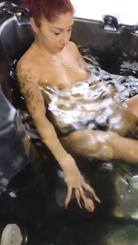 Relaxing in the Jacuzzi, They're Massaging My Breasts