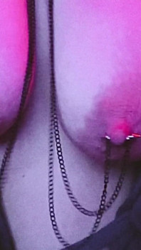 Sexy Pierced MILF Chained to Her Collar by Her Nipples