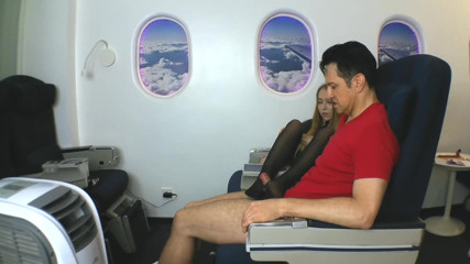 Foot Girls: Stewardess gives nylon footjob in plane!
