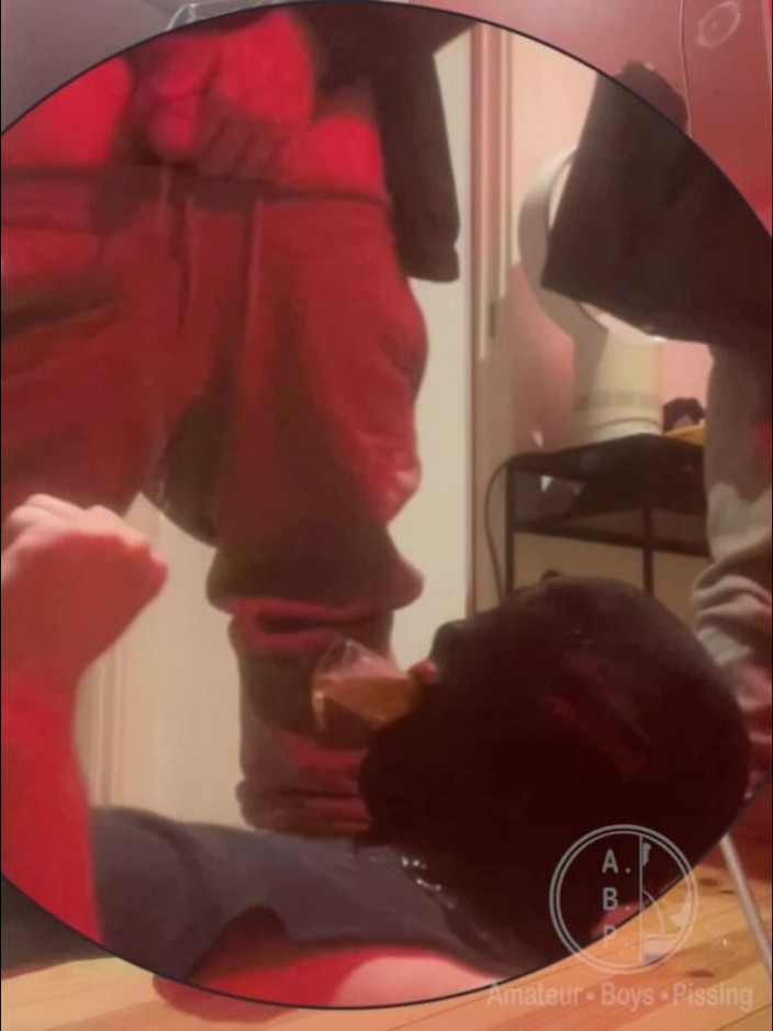 AmateurBoysPissing: Amateur Boy Pissing in a Glass Held in His Friend's...