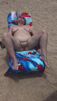 Laying with My Shaved Big Pussy Spread Wide Open on the Nude Beach to Tease Those Walking by and Looking BBW Swinger Wife Feet