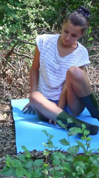 Sexy Babe Wearing Shorts and Rubber Boots Undress in the Forest and Play with Herself