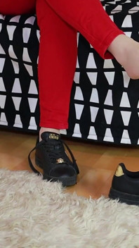 Red Jeans and Black Sneakers