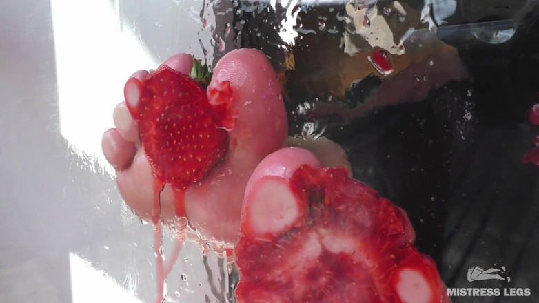 Mistress Legs: Mistress barefoot soles rubbing against the glass and squeezing strawberries