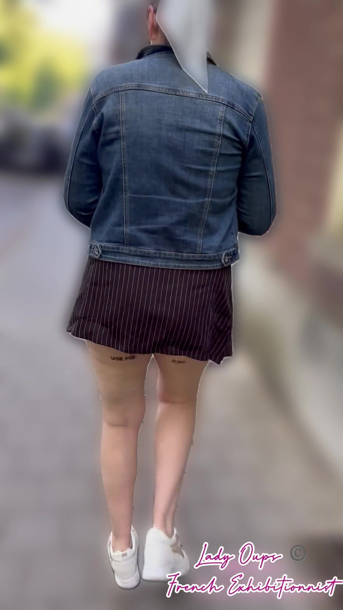 Lady Oups: Exhibition in the City Center in a Micro Skirt with...