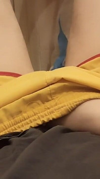 Guy Massages His Dick Through Yellow Shorts