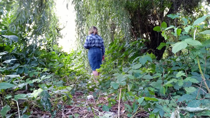 Elena: Russian stepmom pissing outdoors with a butt plug in her...