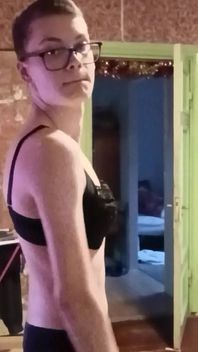 Femboy Abbie Flaunting Her Figure in Lingerie