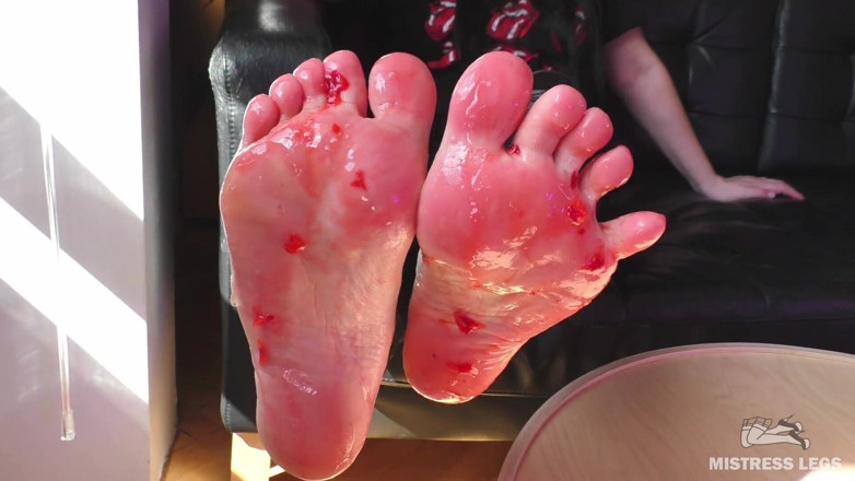 Mistress Legs: Mistress barefoot soles rubbing against the glass and squeezing strawberries