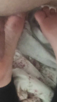 Playing with Friends Soles, While She's Reading.