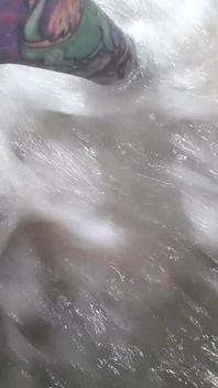 Beach Feet Covered in Wet Sand