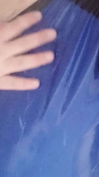 Latex Boy in Blue Black Latex Swimwear in the Shower